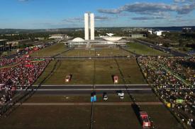 photo of Brazil parliament and protest crowds
